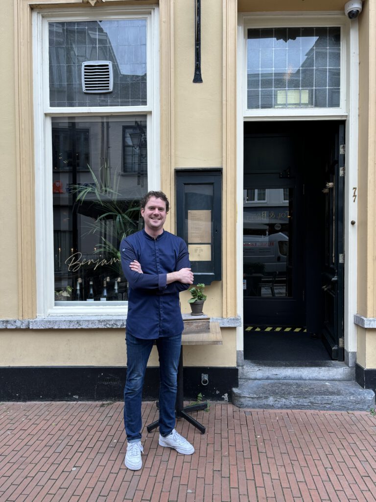 Chiel Seuren in front of Restaurant Benjamin.