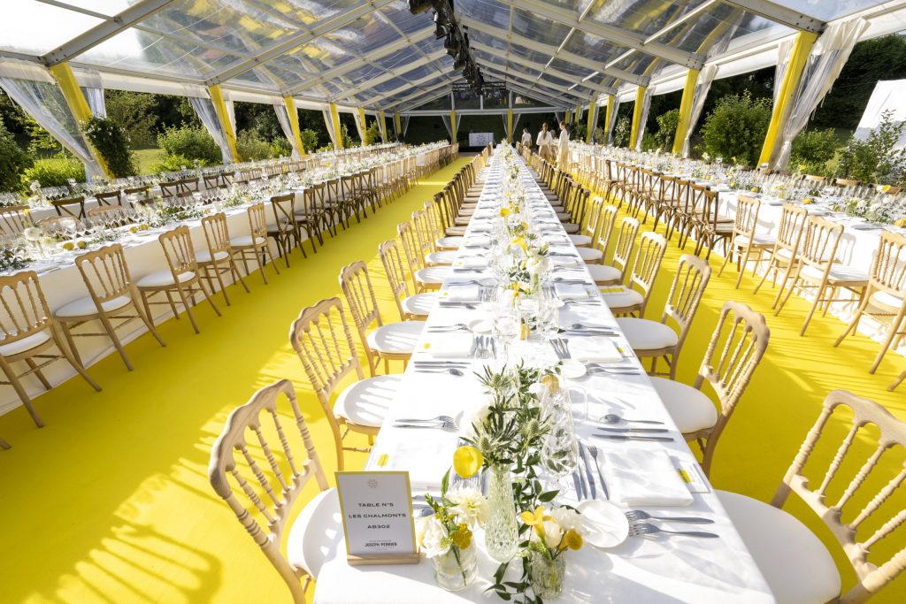 Long dining tables set the scene for a memorable evening.