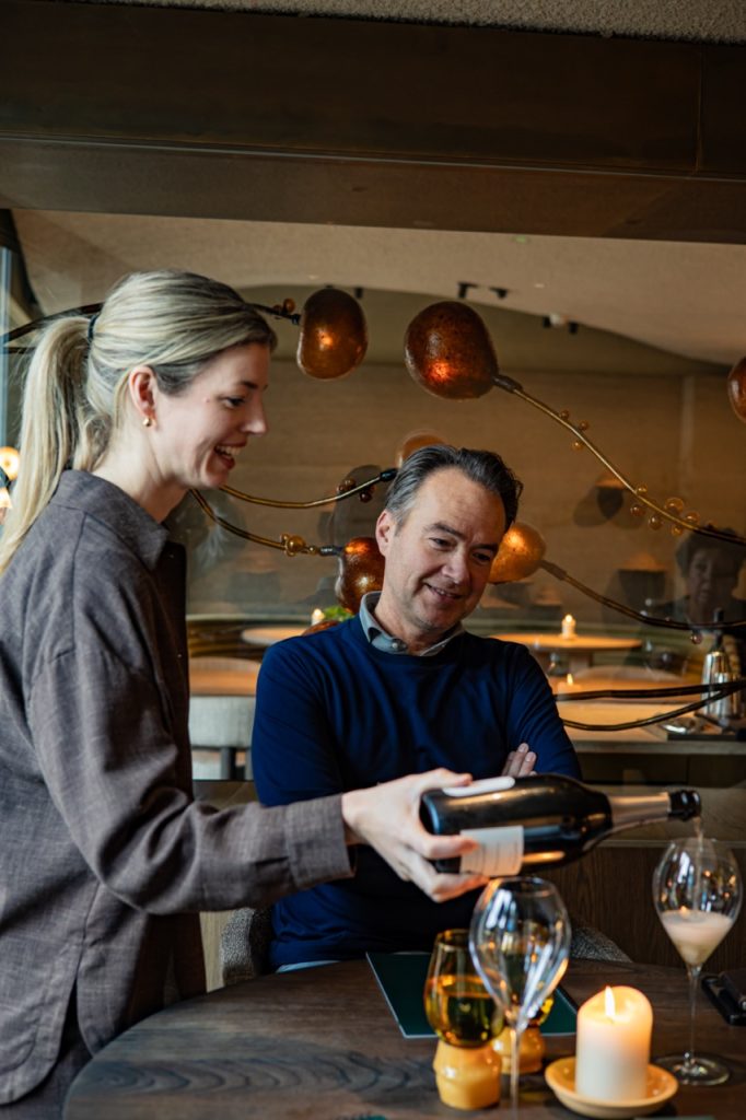 Flore's Maitre Roos Stevens pouring Champagne Billecart-Salmon preserved by Coravin.