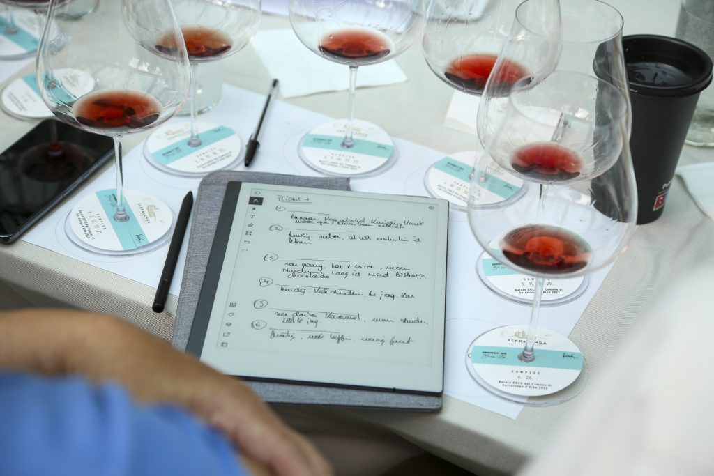 A participant during the blind tasting, carefully analysing one of many wines — all bottled as Barolo del Comune di Serralunga d’Alba, with no mention of MGA or single vineyard.