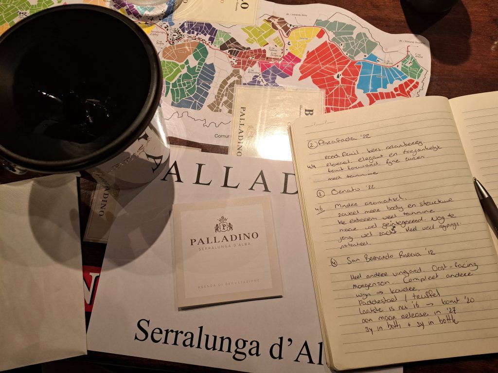 Notes, maps, and glasses at Palladino — a family estate where Serralunga d’Alba’s legacy is carefully charted.