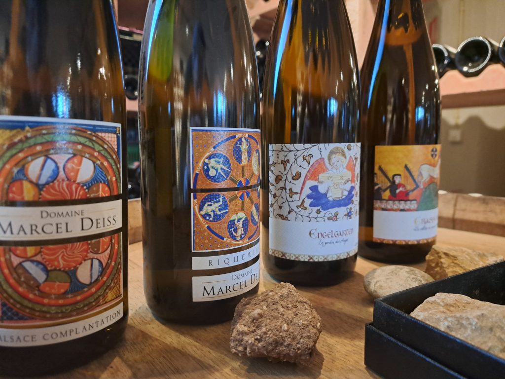 From limestone to marl to Jurassic rock — the four wines tasted during the masterclass, each a field blend from a distinct terroir. Left to right: Alsace Complantation, Riquewihr, Engelgarten, Grasberg