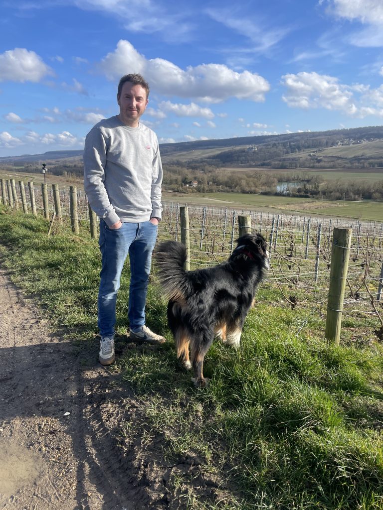Bryan and his dog in the Vineyards.