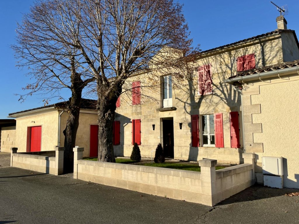 Château Clinet, Iconic and Recognisable with its Red Shutters and Doors.
